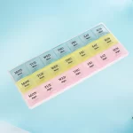 Přenosný týdenní dávkovač na léky s 21 přihrádkami | dávkovač léků, krabička na vitamíny