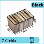 černé kalhoty se 7 mřížkami