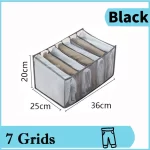 šedé kalhoty se 7 mřížkami