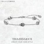 Stříbrný dámský náramek lebky | šperk