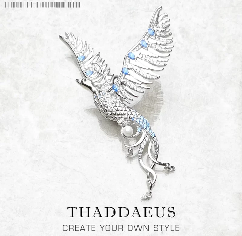 Stříbrný přívěsek fénix s modrým kamenem | šperk