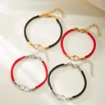 Červený šňůrkový náramek dvojité srdce | šperk